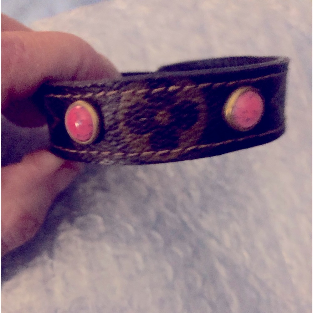 These 3 bracelets were made from the leather of an old handbag. 8” long each.